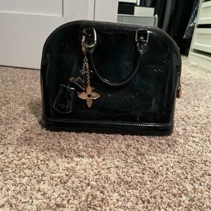 LV alma bag with charm